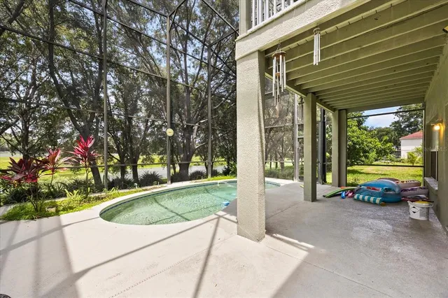 a view of a park with iron fence