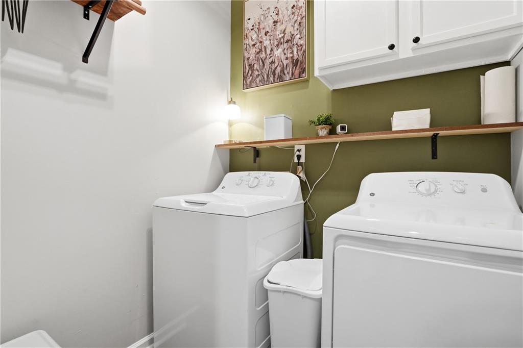 378 Baugh Street Commerce, GA 30529 - Photo 28 of 35 a utility room with dryer and washer