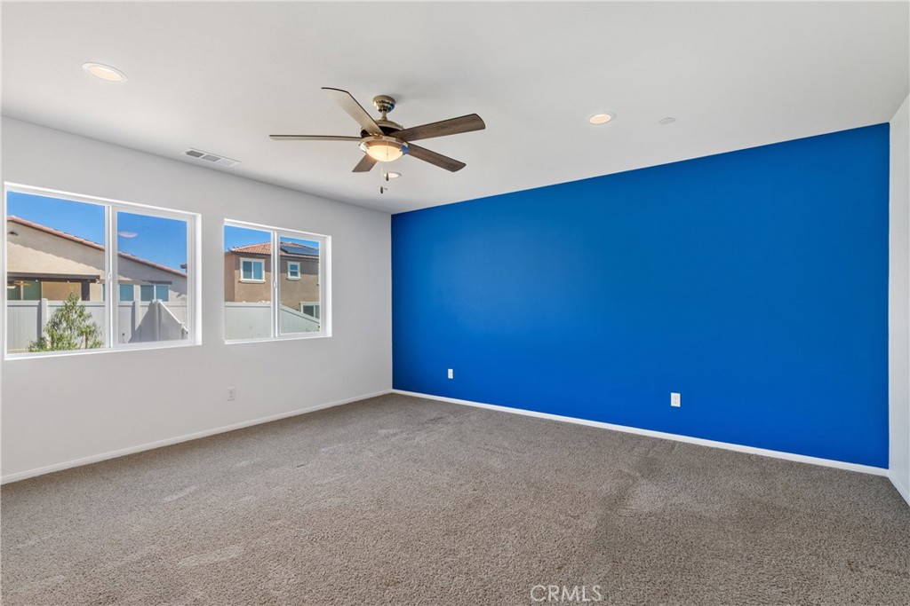 11738 Murray Way Beaumont, CA 92223 - Photo 13 of 45 a view of an empty room with a window