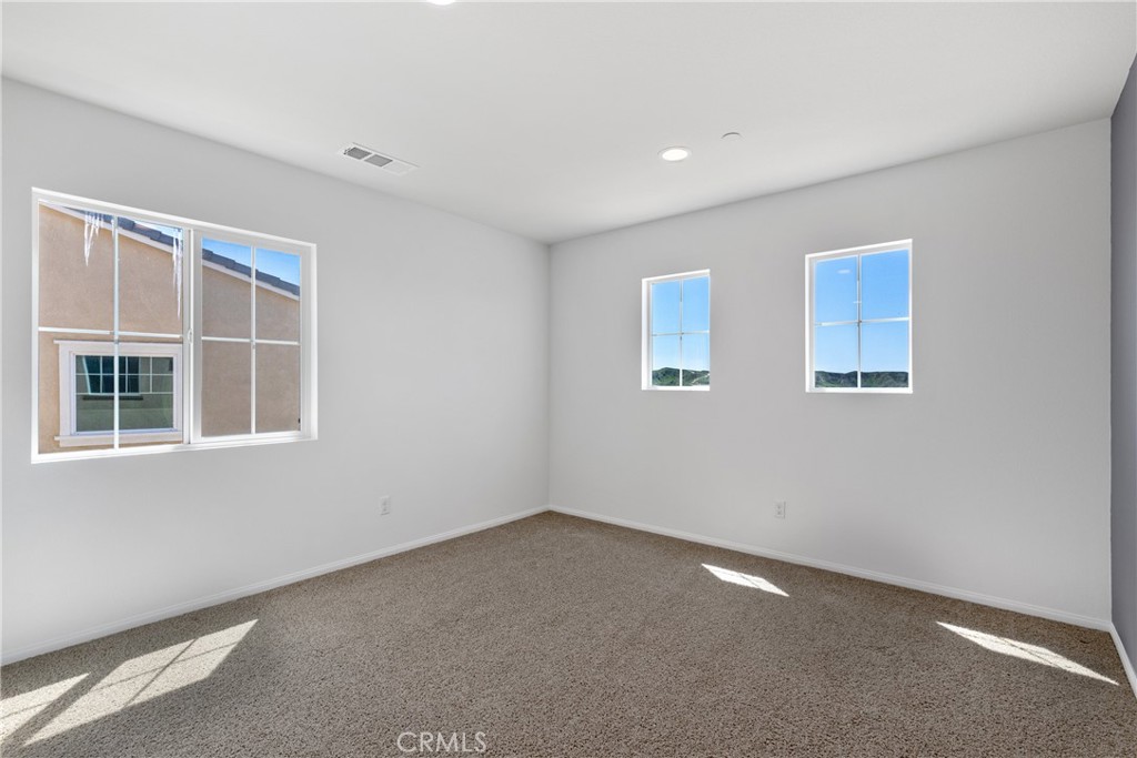 11738 Murray Way Beaumont, CA 92223 - Photo 18 of 45 an empty room with a window