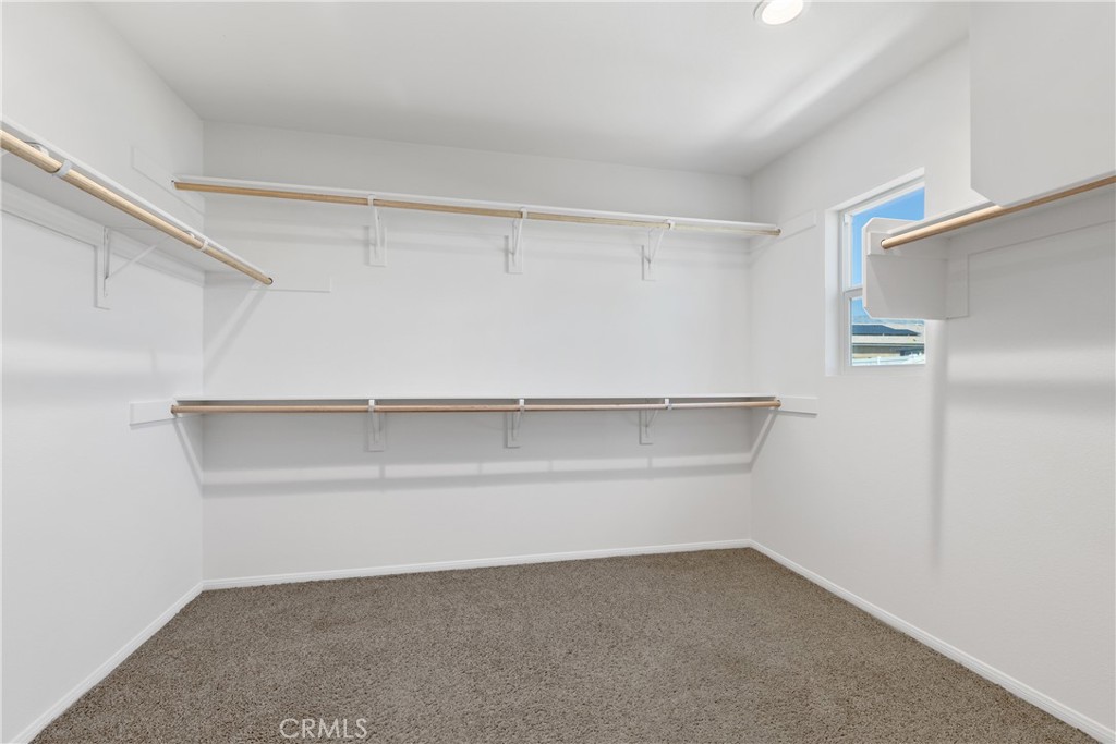 11738 Murray Way Beaumont, CA 92223 - Photo 23 of 45 a view of an empty walk in closet