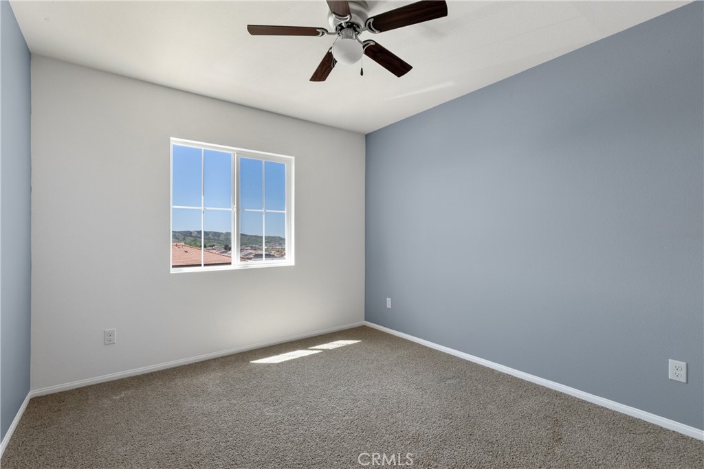 11738 Murray Way Beaumont, CA 92223 - Photo 26 of 45 a view of an empty room with a window