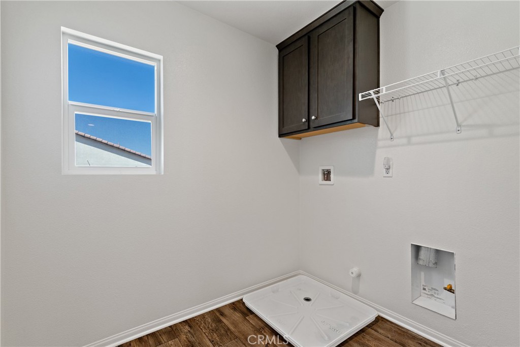 11738 Murray Way Beaumont, CA 92223 - Photo 28 of 45 a room with storage and utility