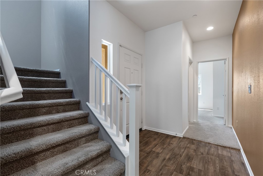 11738 Murray Way Beaumont, CA 92223 - Photo 4 of 45 a view of staircase with white walls and railing