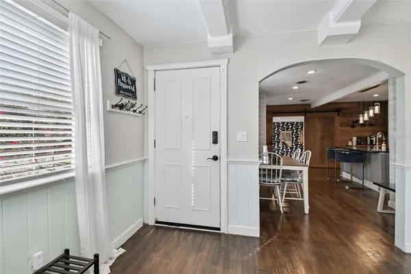 a view of a living room and dining room