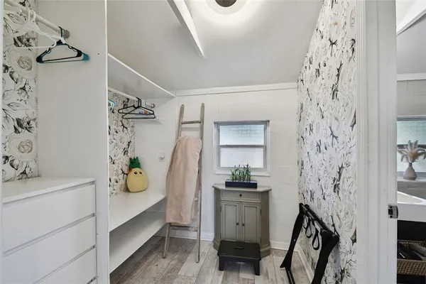 a bathroom with a shower toilet and sink