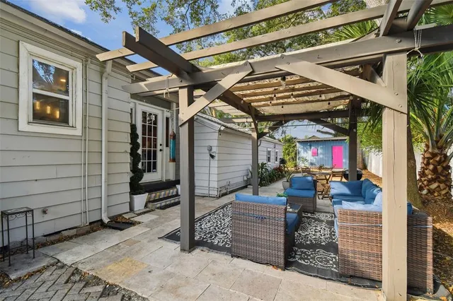 a view of a park with large trees