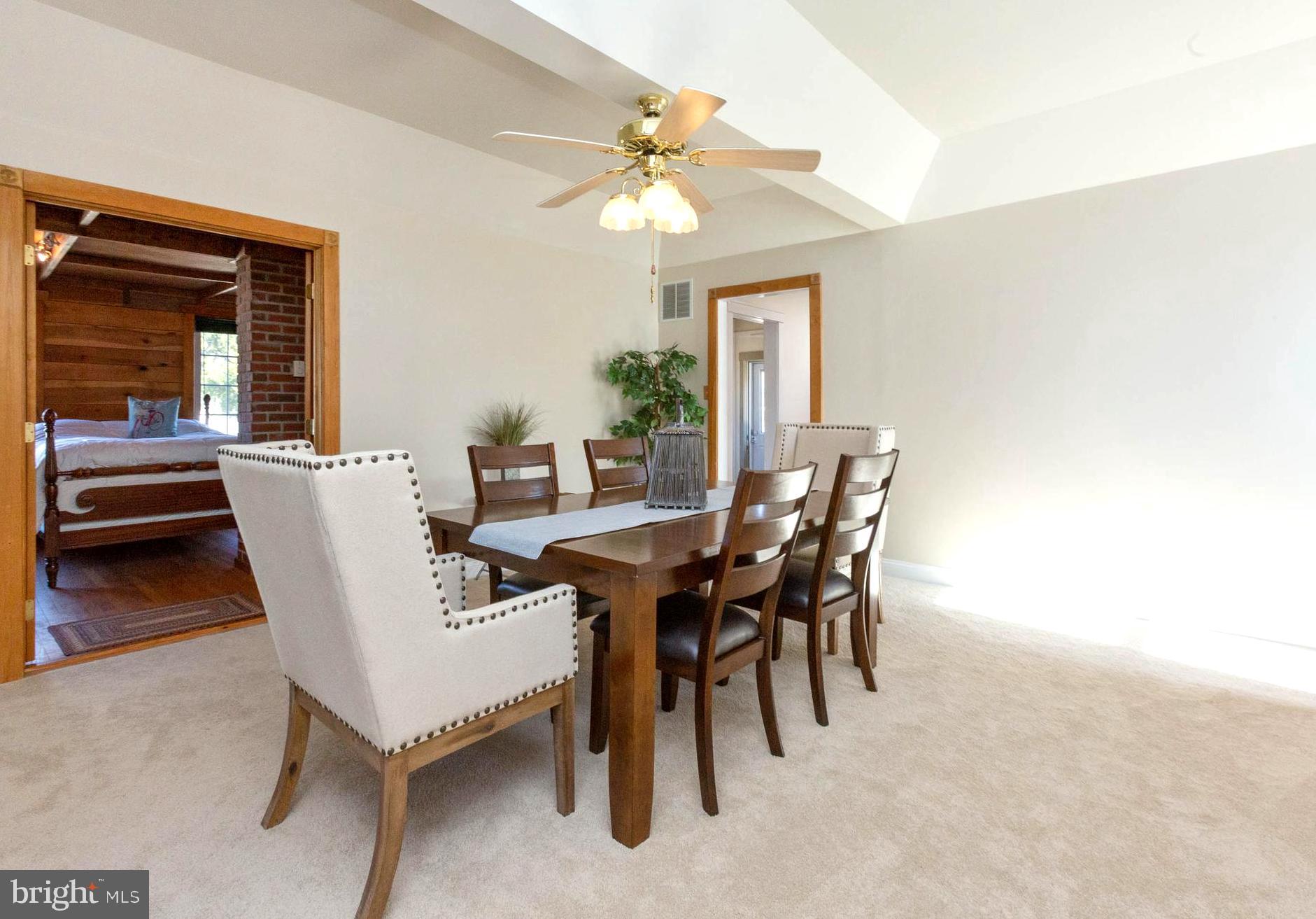 237 Carvel Road Pasadena, MD 21122 - Photo 13 of 44 Bright Dining Room with Chandelier Fan