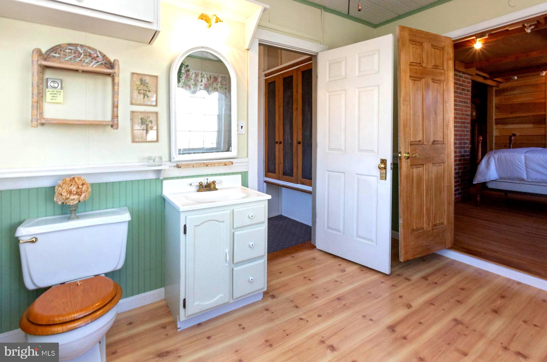 237 Carvel Road Pasadena, MD 21122 - Photo 24 of 44 Convenient Hall Access to Main Level Full Bath