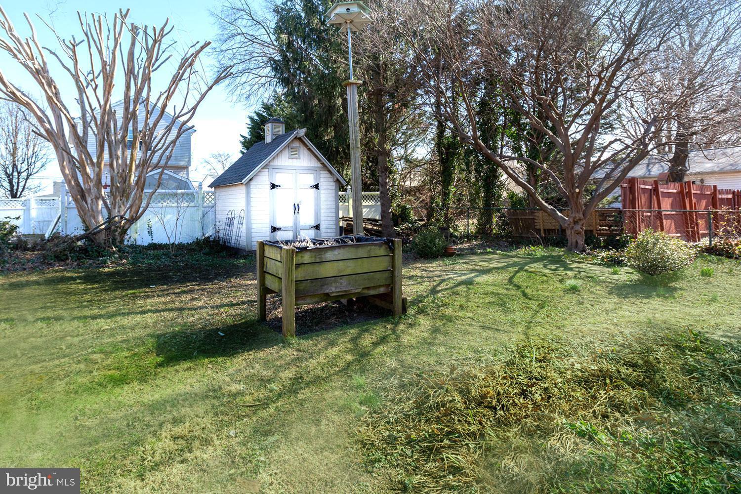 237 Carvel Road Pasadena, MD 21122 - Photo 27 of 44 Mature Plantings . Quaint Detached Storage Shed