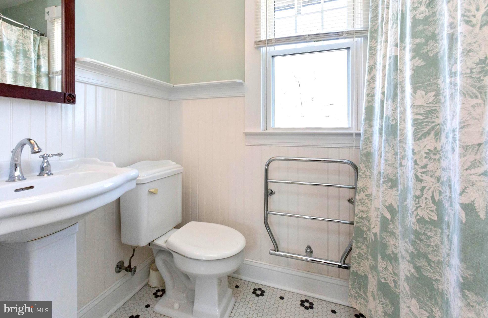 237 Carvel Road Pasadena, MD 21122 - Photo 31 of 44 Wainscoting . Pedestal Sink . Heated Towel Rack