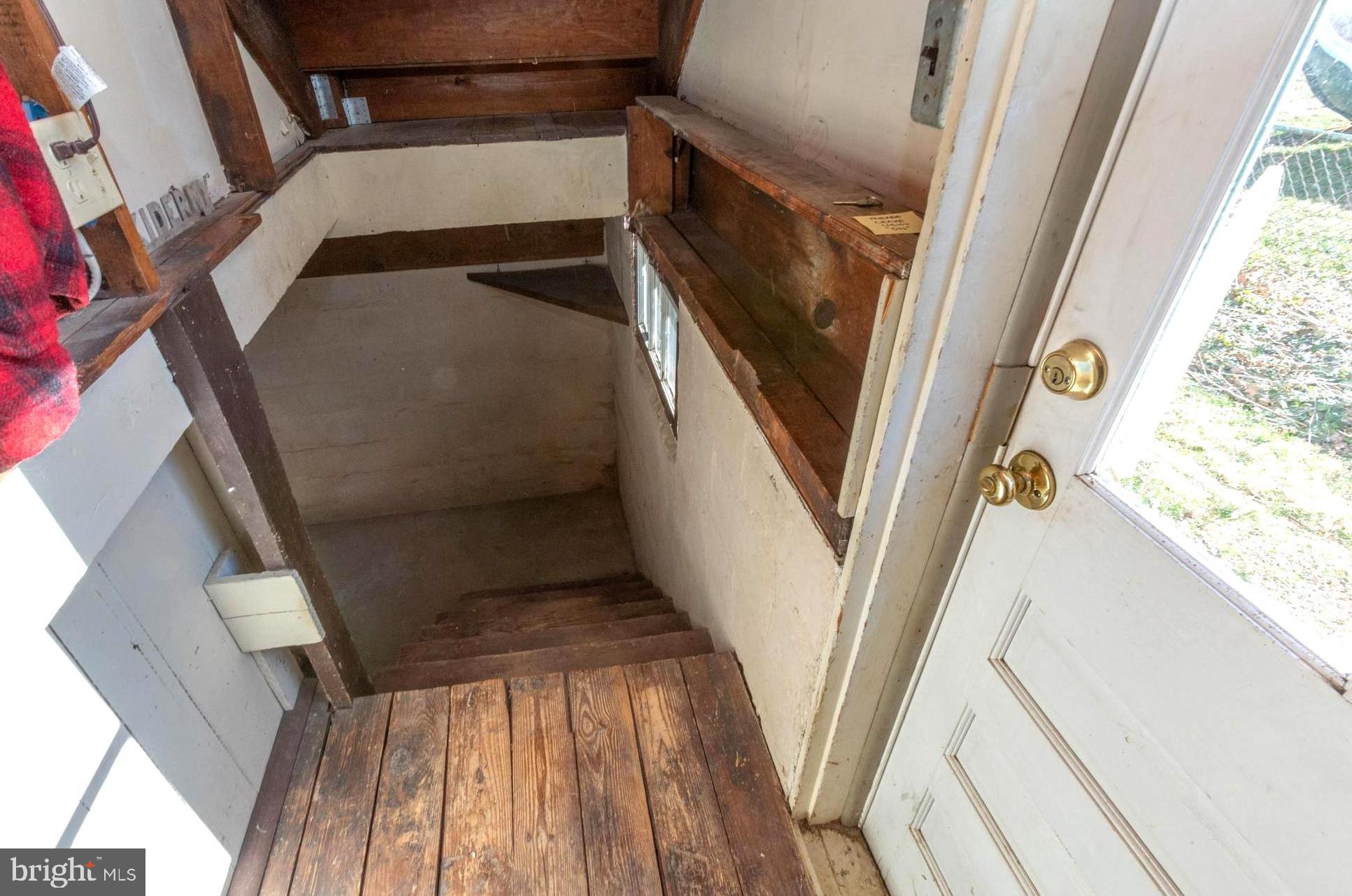 237 Carvel Road Pasadena, MD 21122 - Photo 37 of 44 Convenient Side Door Access to Basement!