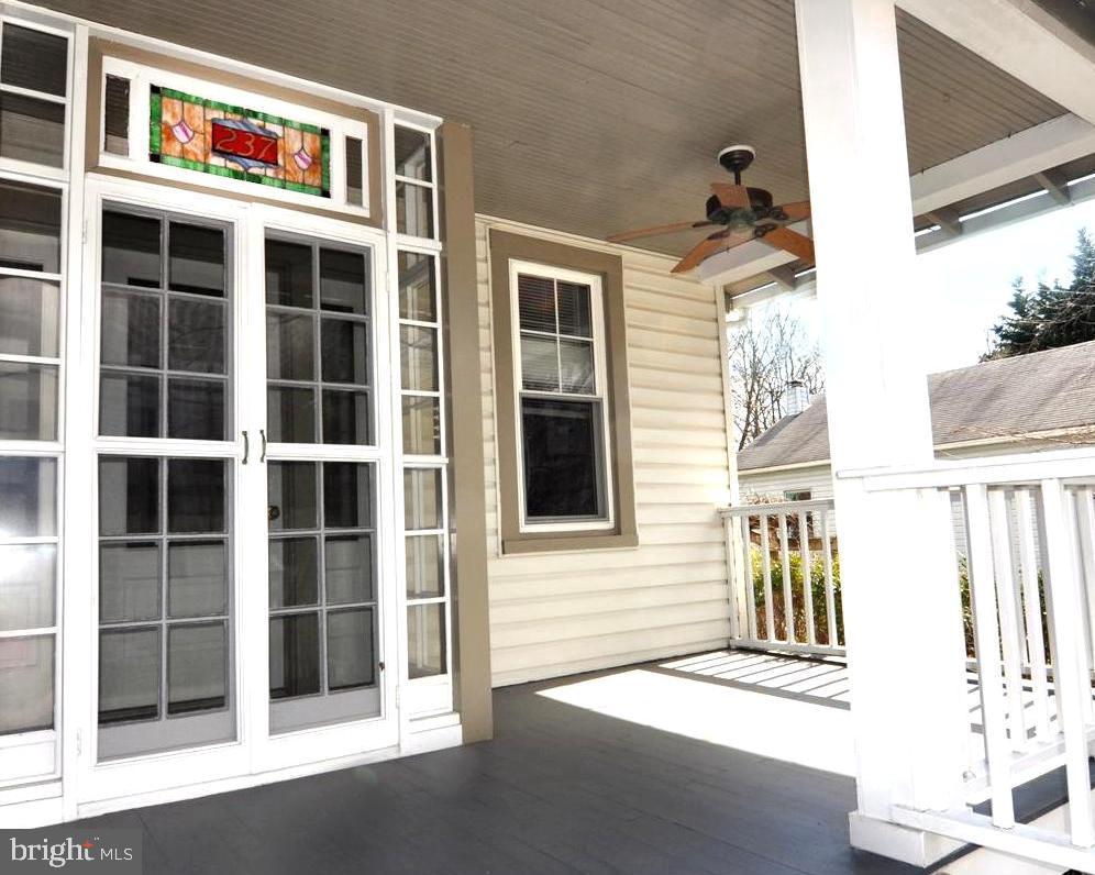 237 Carvel Road Pasadena, MD 21122 - Photo 5 of 44 Porch Vestibule with Stained Glass Crest