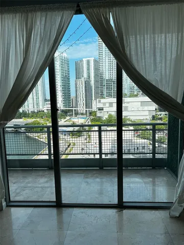 a view of swimming pool from a balcony