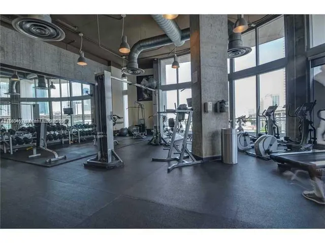 a living room with lots of furniture