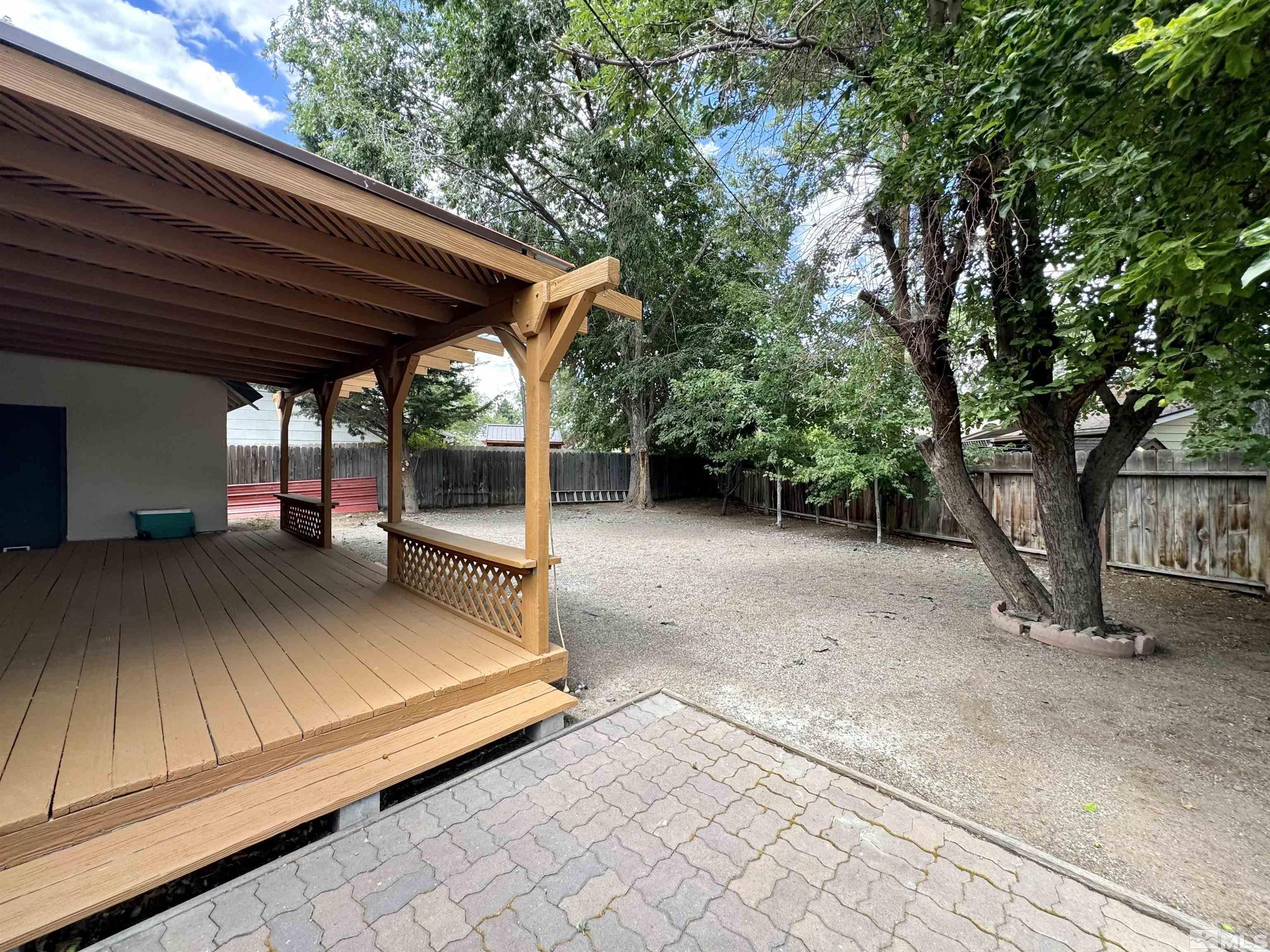 4640 Aster Drive Reno, NV 89502 - Photo 20 of 22 a view of a backyard with a small cabin