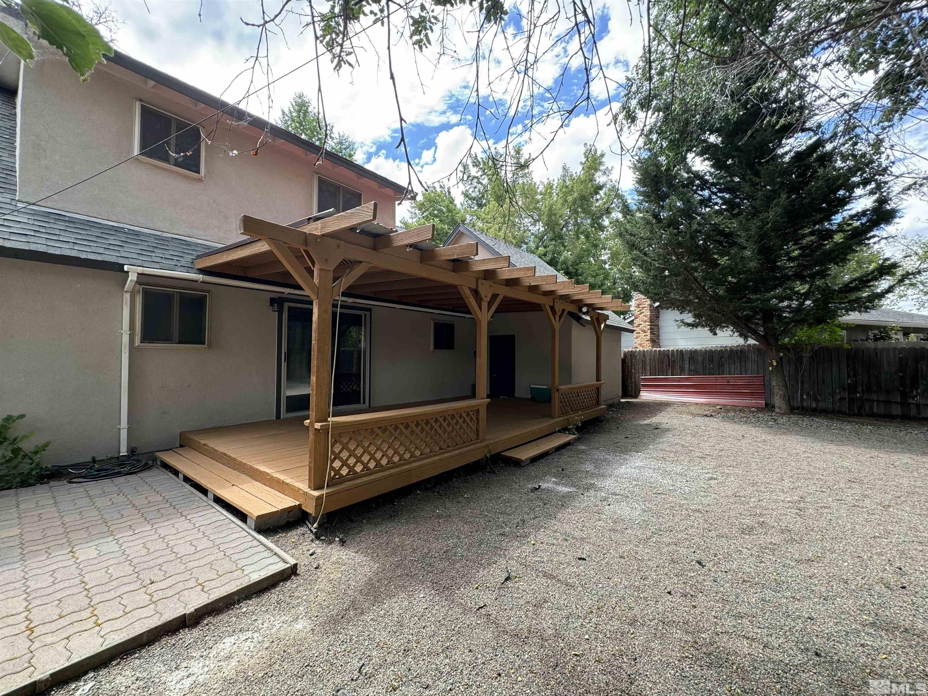 4640 Aster Drive Reno, NV 89502 - Photo 21 of 22 a view of a house with a yard