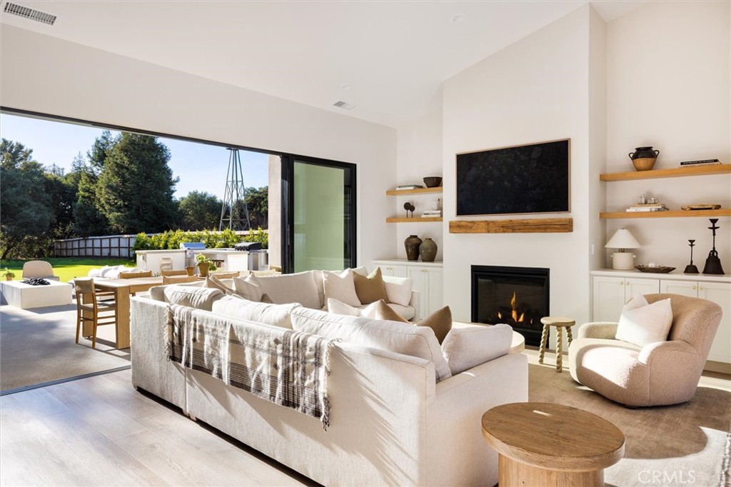 5260 Windmill Way San Luis Obispo, CA 93401 - Photo 12 of 35 a living room with furniture and a flat screen tv