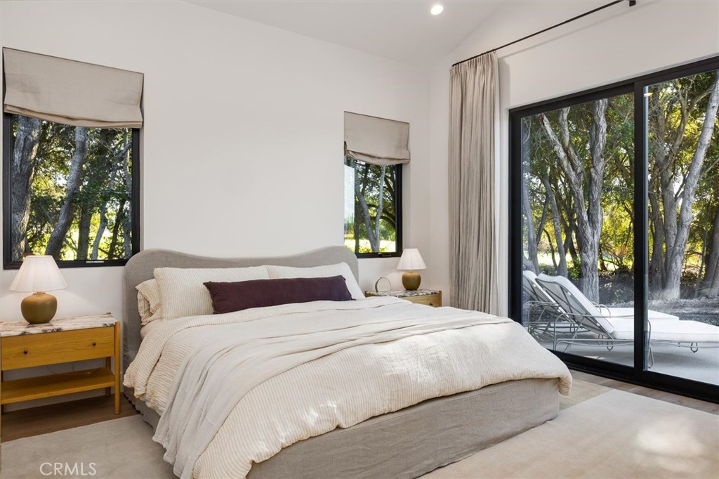 5260 Windmill Way San Luis Obispo, CA 93401 - Photo 15 of 35 a bedroom with a bed and a window