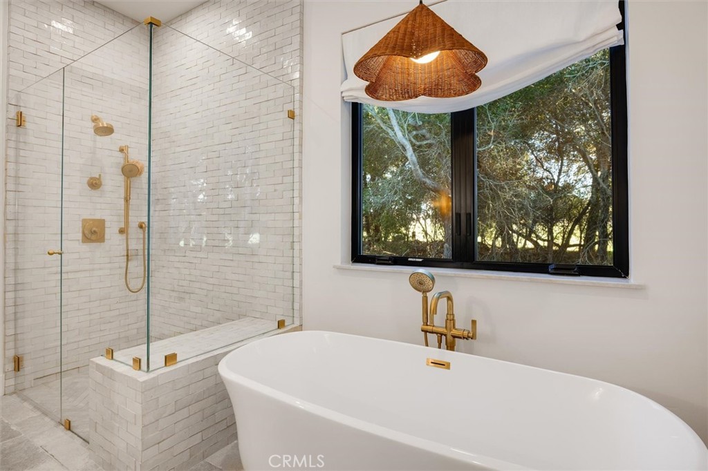 5260 Windmill Way San Luis Obispo, CA 93401 - Photo 18 of 35 a bathroom with a sink and a bathtub