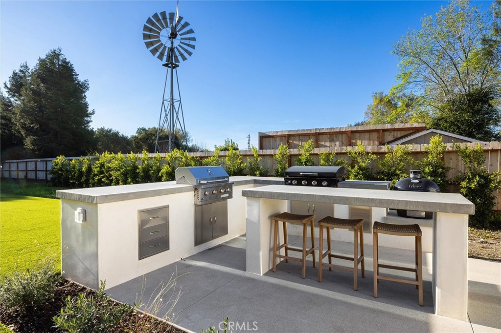 5260 Windmill Way San Luis Obispo, CA 93401 - Photo 27 of 35 a view of an outdoor kitchen and a kitchen