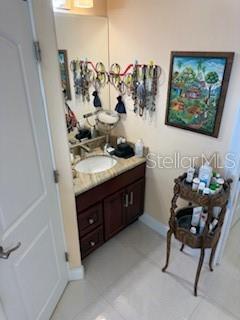3013 West Leroy Street Tampa, FL 33607 - Photo 14 of 22 a living room with furniture and a dresser
