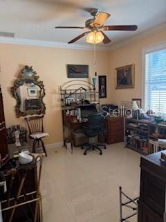 3013 West Leroy Street Tampa, FL 33607 - Photo 19 of 22 a room with furniture a flat screen tv and a window
