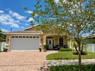 3013 West Leroy Street Tampa, FL 33607 - Photo 2 of 22 a front view of a house with garden