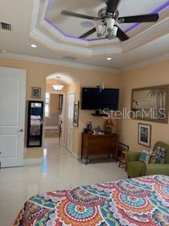 3013 West Leroy Street Tampa, FL 33607 - Photo 9 of 22 a bedroom with furniture and a wooden floor