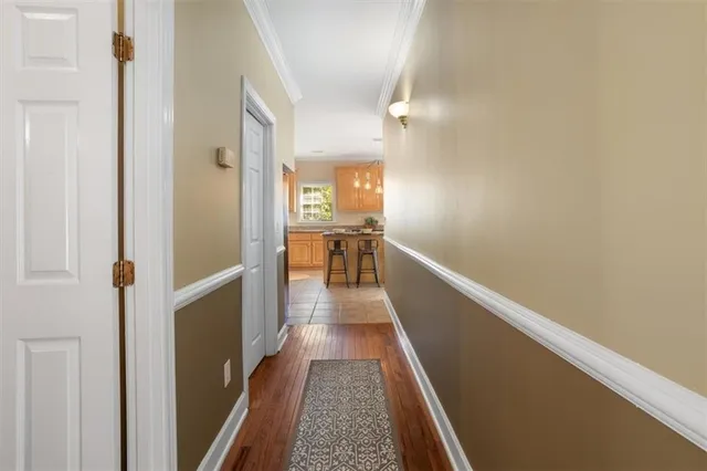a kitchen with stainless steel appliances granite countertop a sink counter space cabinets and a stove