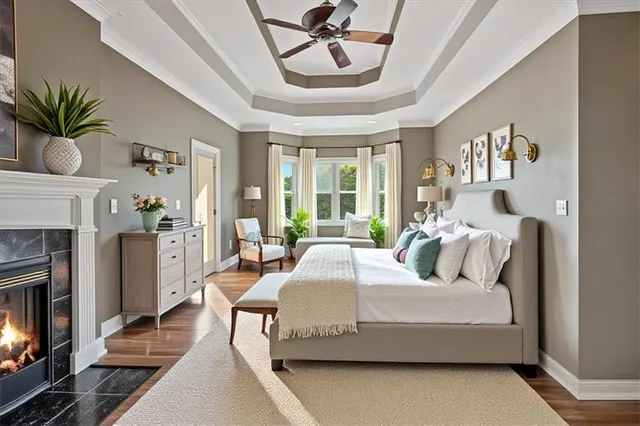 a living room with furniture a chandelier and a dining table