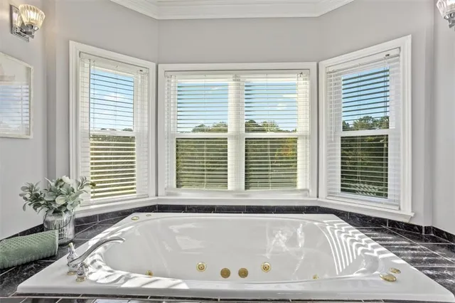 a view of a lake with houses in the back