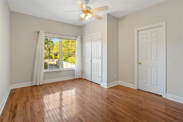 a backyard of a house with lots of green space