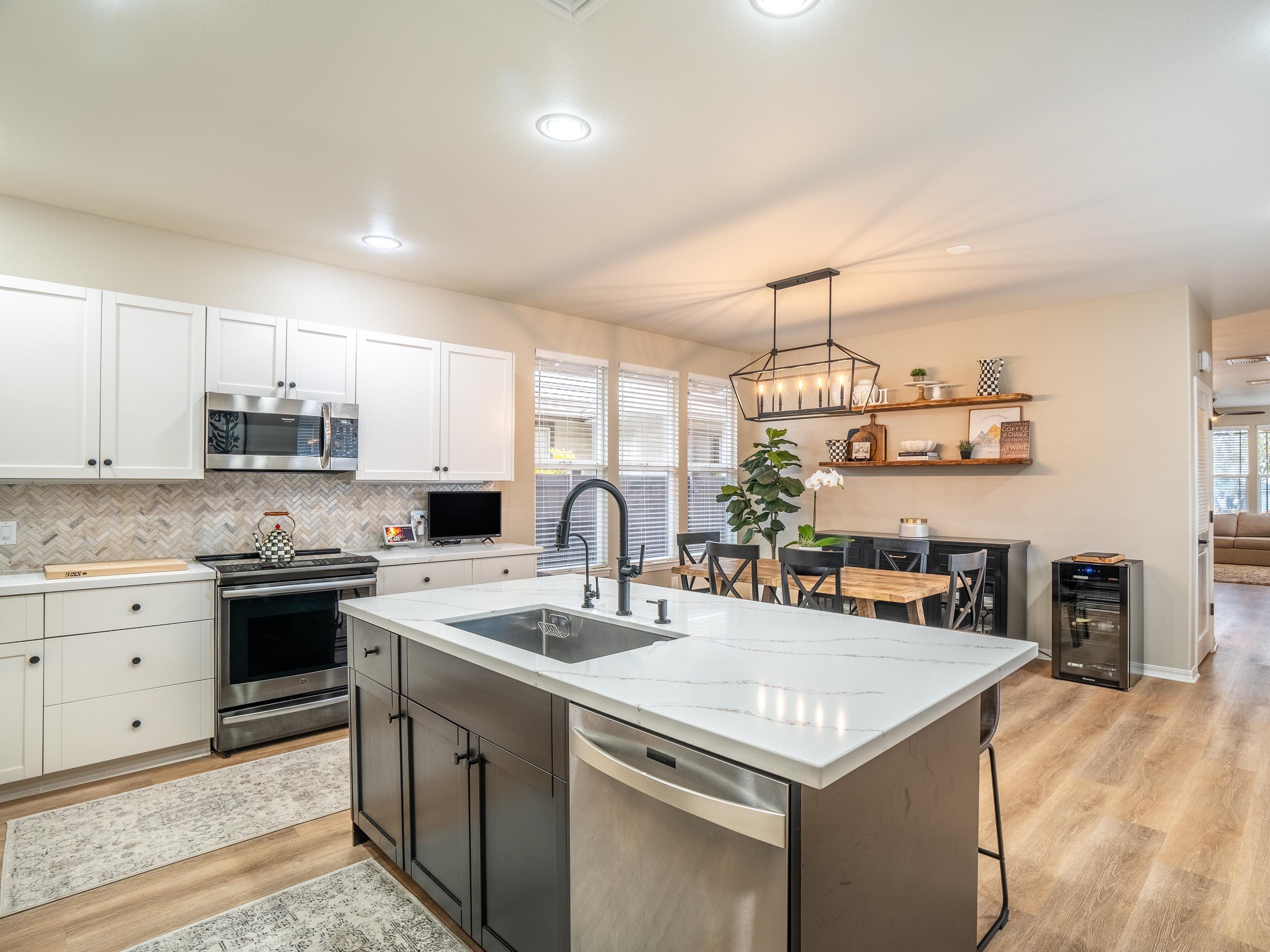 42 Maunaleo Place Wailuku, HI 96793 - Photo 12 of 36 a kitchen with a stove sink and cabinets