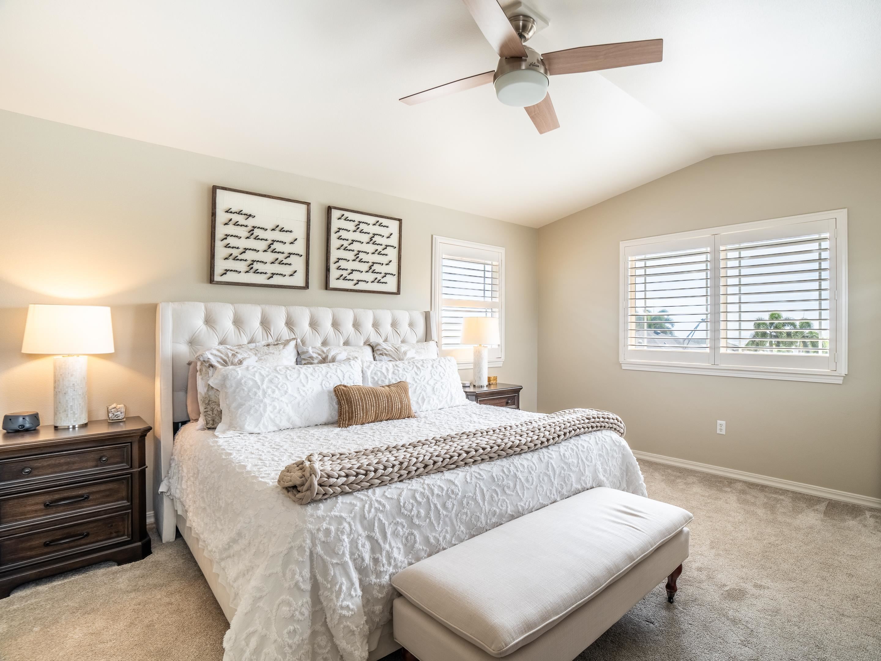 42 Maunaleo Place Wailuku, HI 96793 - Photo 23 of 36 a bedroom with a bed and wooden floor