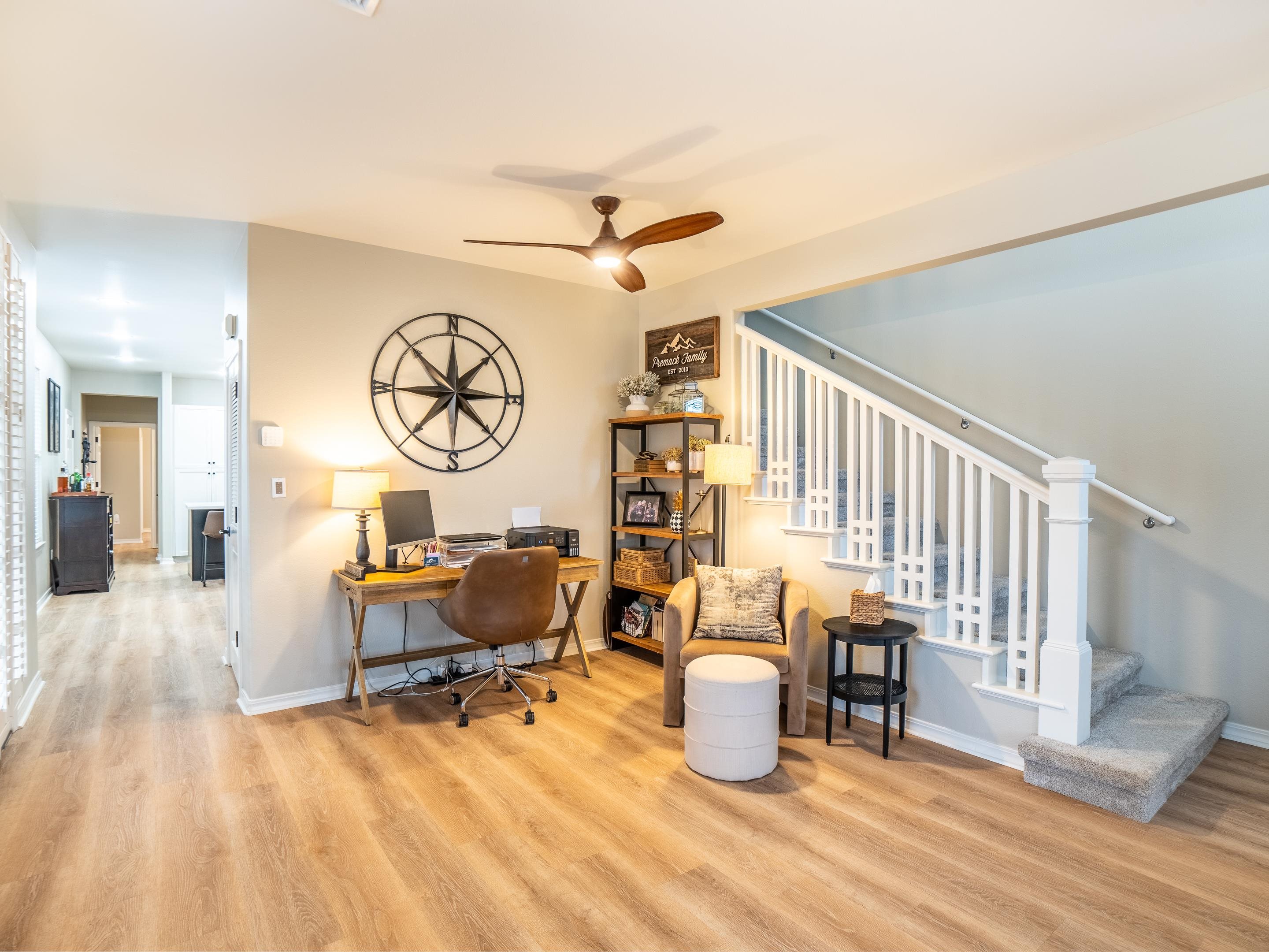 42 Maunaleo Place Wailuku, HI 96793 - Photo 3 of 36 a living room with fireplace furniture and a wooden floor