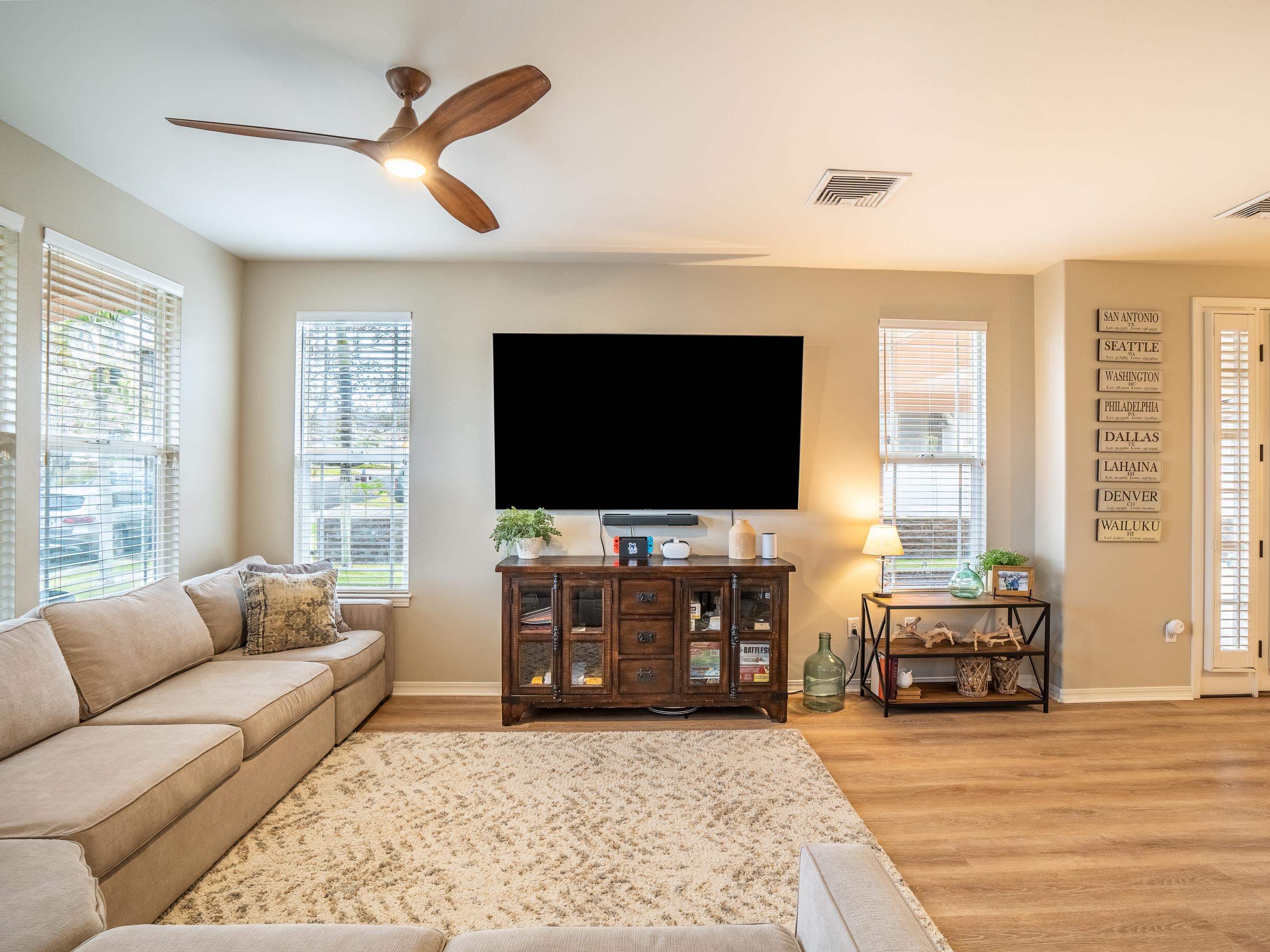 42 Maunaleo Place Wailuku, HI 96793 - Photo 6 of 36 a living room with furniture and a flat screen tv
