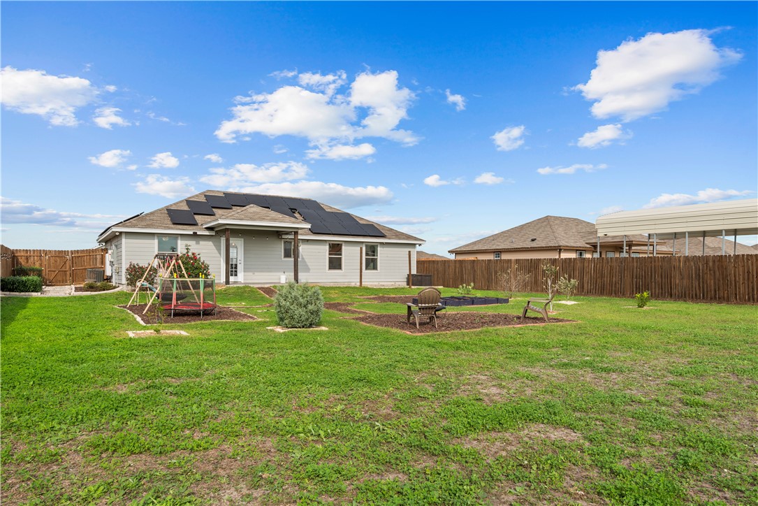 103 Atkinson Drive Orange Grove, TX 78372 - Photo 30 of 30 a view of a house with backyard and sitting area