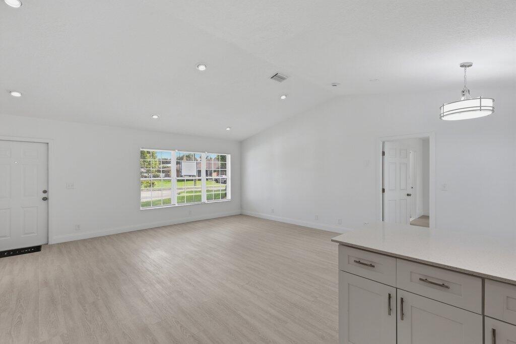 6900 2nd Street Jupiter, FL 33458 - Photo 12 of 24 Kitchen to Living.jpeg-SMALL