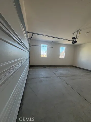 a kitchen with sink and cabinets