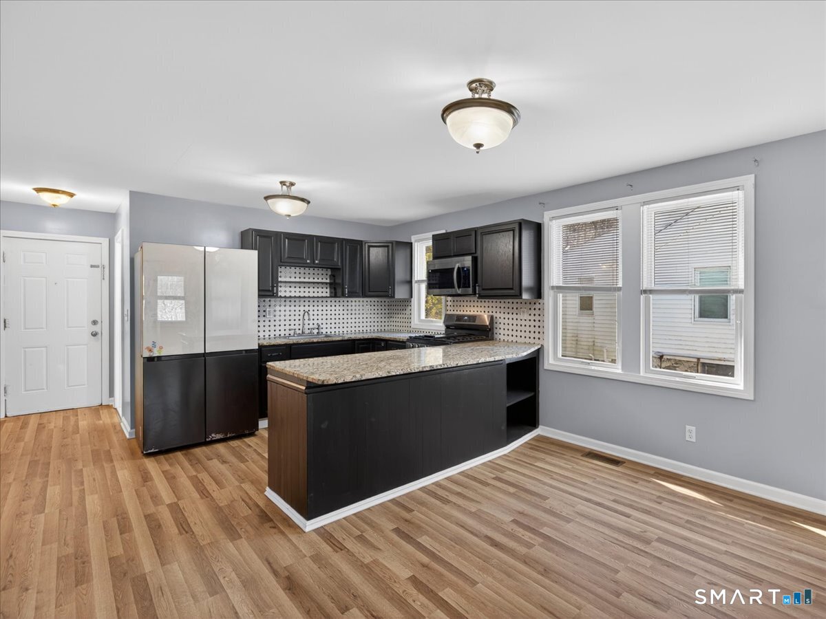 91 Jewett Street Ansonia, CT 06401 - Photo 27 of 30 Kitchen and Open Floor Plan
