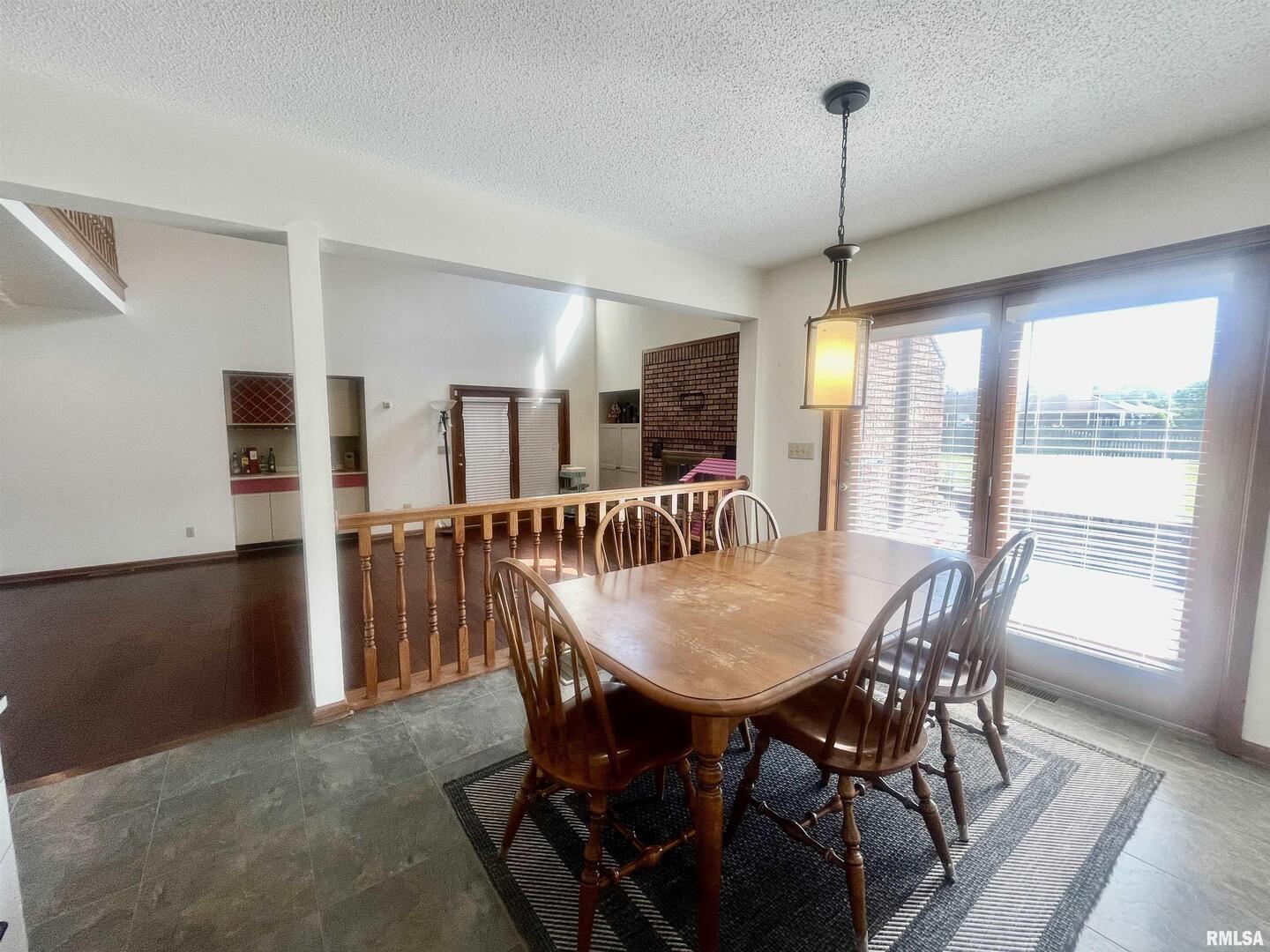 9 Brian Drive Metropolis, IL 62960 - Photo 27 of 71 a dining room with furniture window and wooden floor