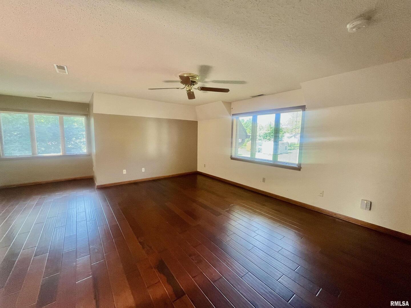 9 Brian Drive Metropolis, IL 62960 - Photo 38 of 71 wooden floor in an empty room with a window