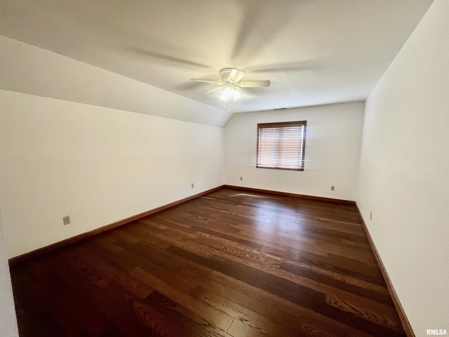 9 Brian Drive Metropolis, IL 62960 - Photo 43 of 71 an empty room with wooden floor and window