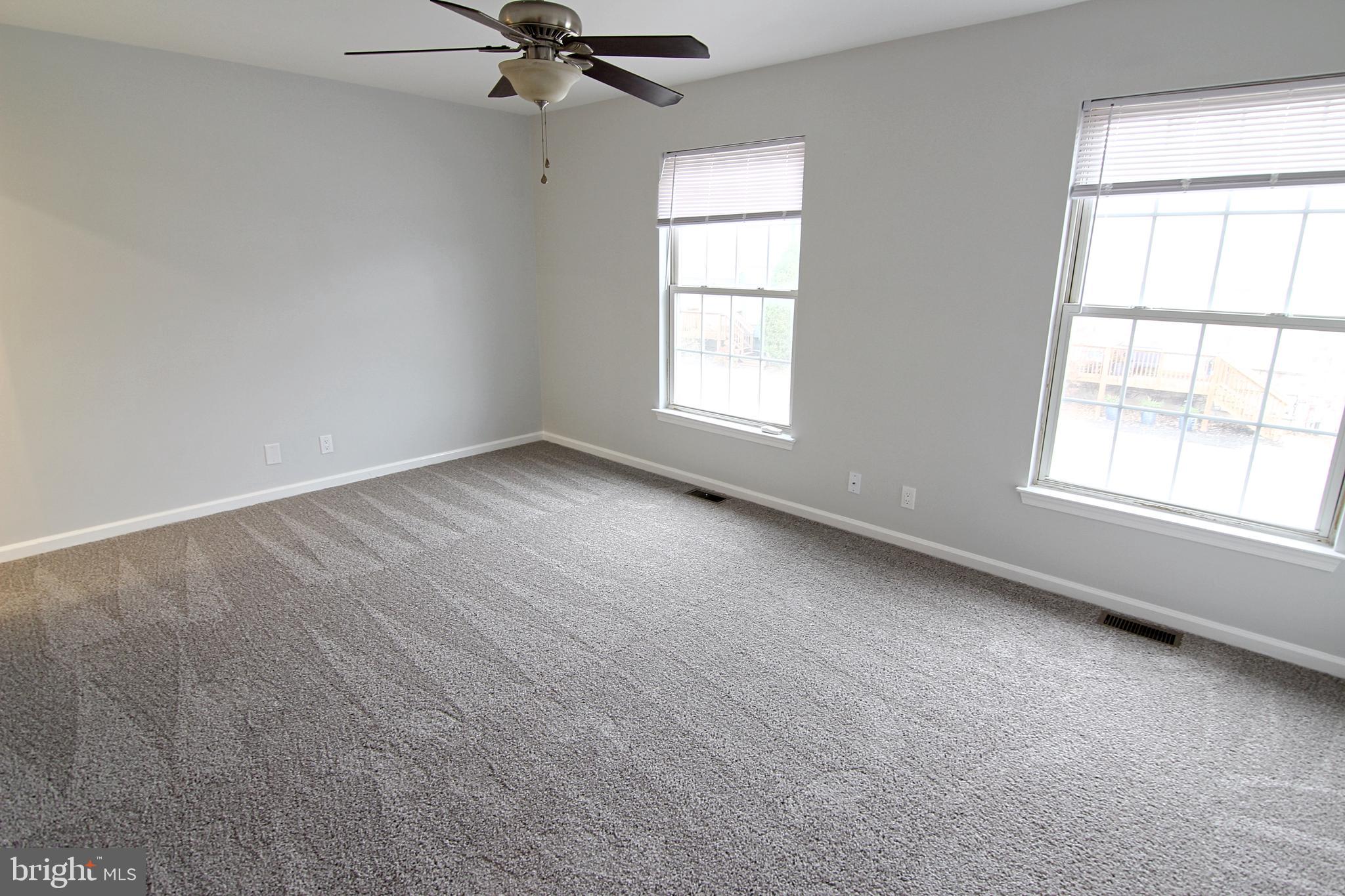 7923-31 Ridge Avenue, Unit 38 Philadelphia, PA 19128 - Photo 9 of 23 an empty room with a window