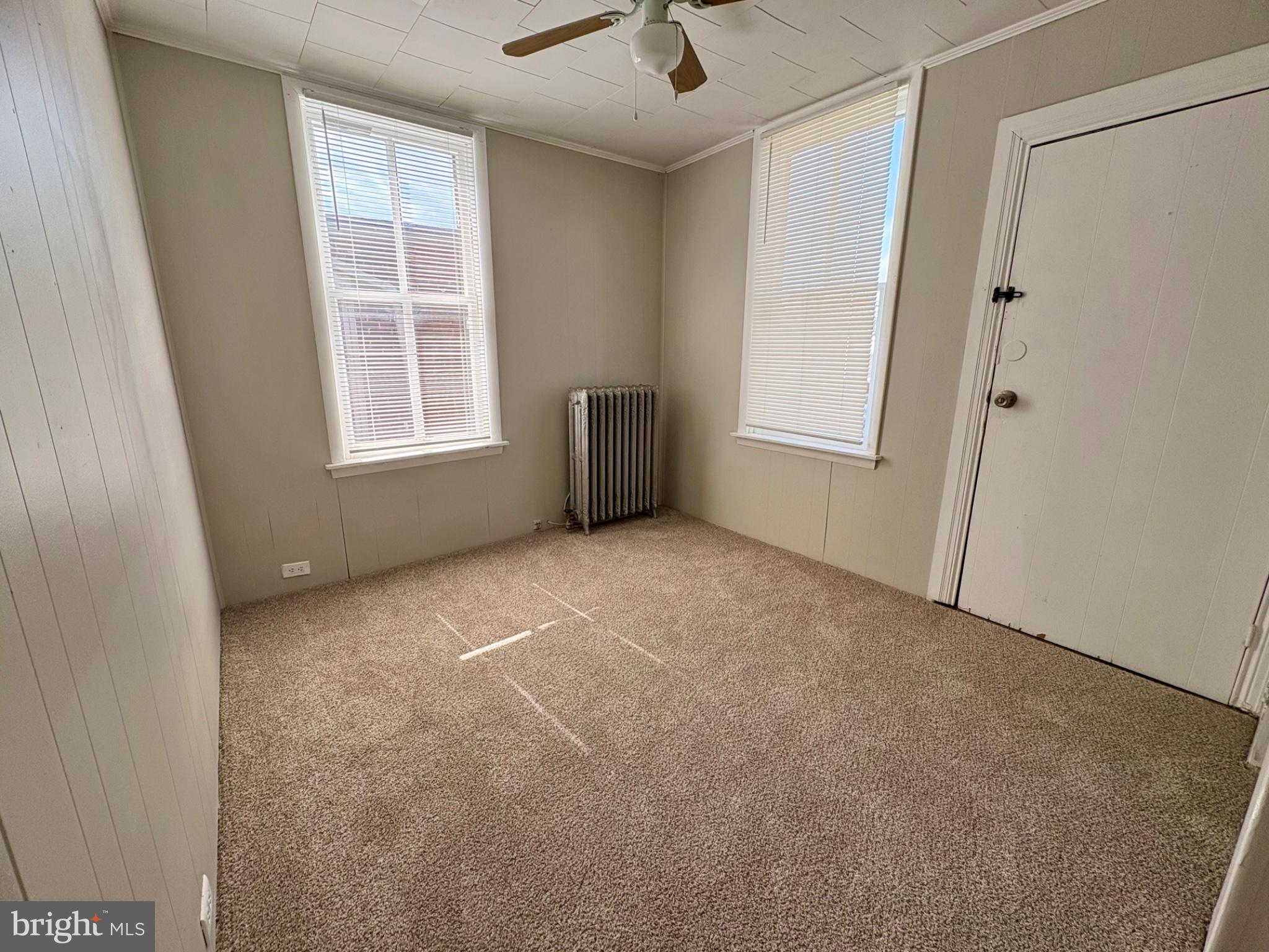 257 West Jackson Street York, PA 17401 - Photo 14 of 27 an empty room with windows and closet
