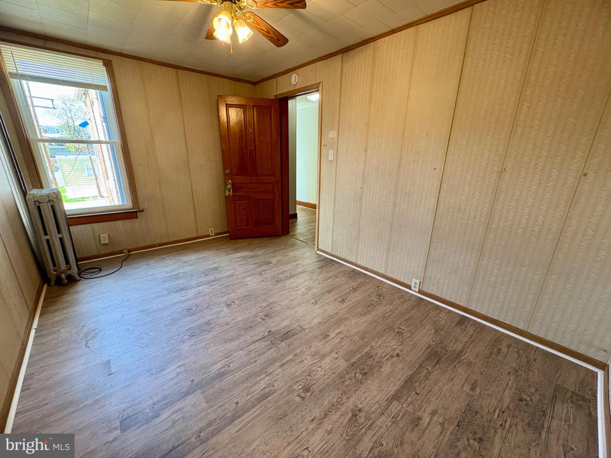257 West Jackson Street York, PA 17401 - Photo 20 of 27 wooden floor in an empty room with a window