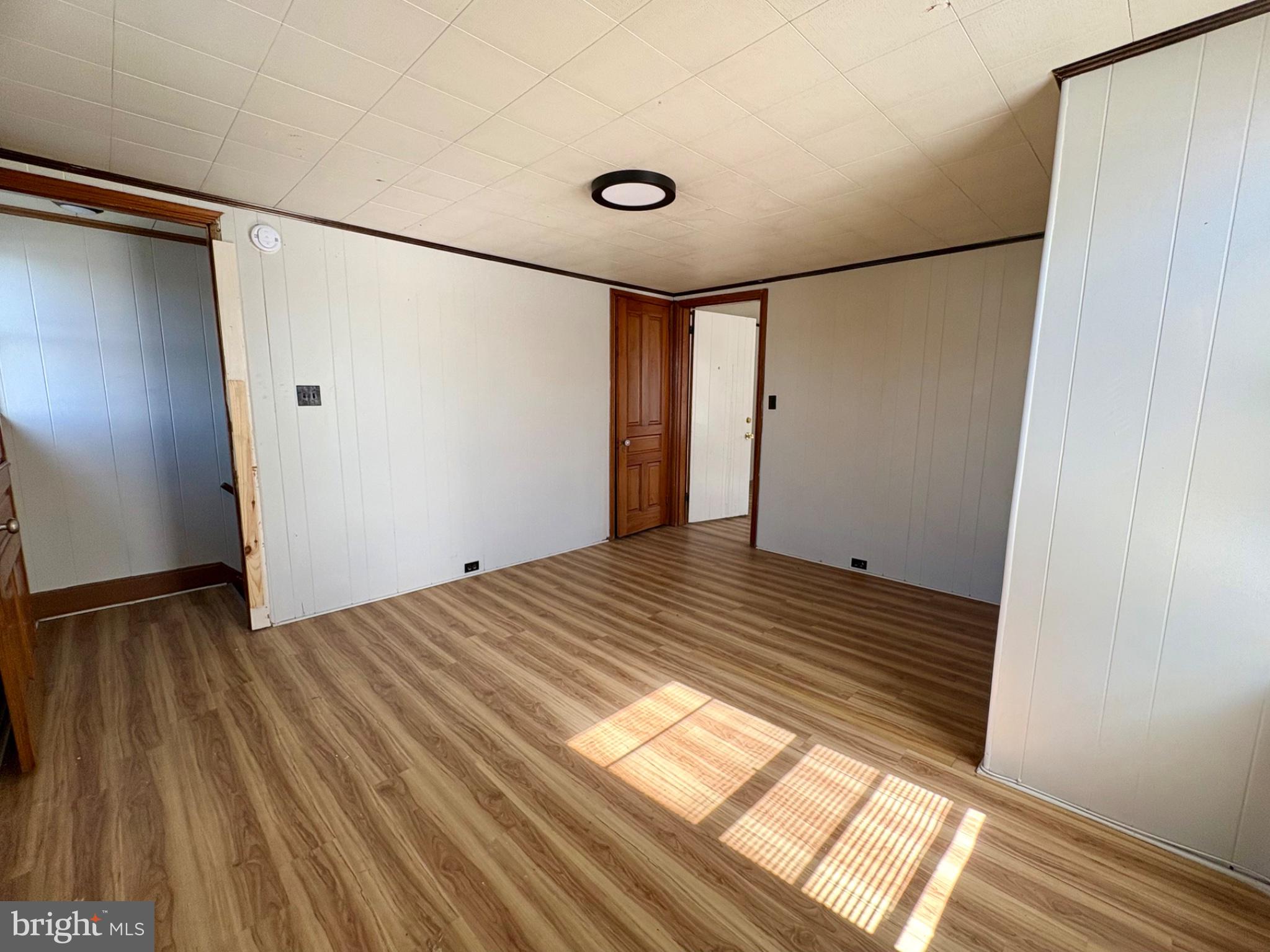 257 West Jackson Street York, PA 17401 - Photo 25 of 27 a view of a big room with wooden floor and windows