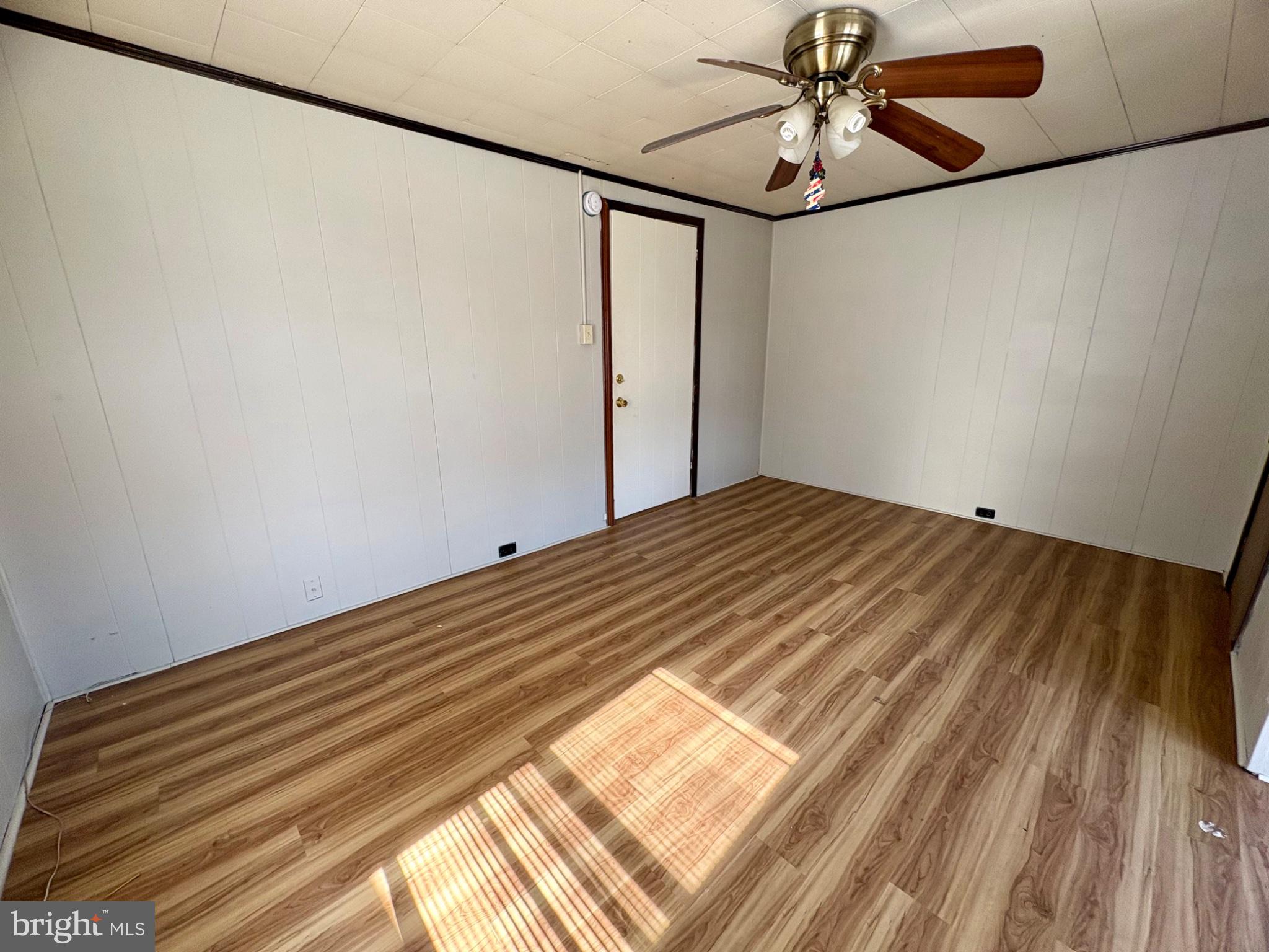 257 West Jackson Street York, PA 17401 - Photo 27 of 27 a view of a room with wooden floor and chandelier