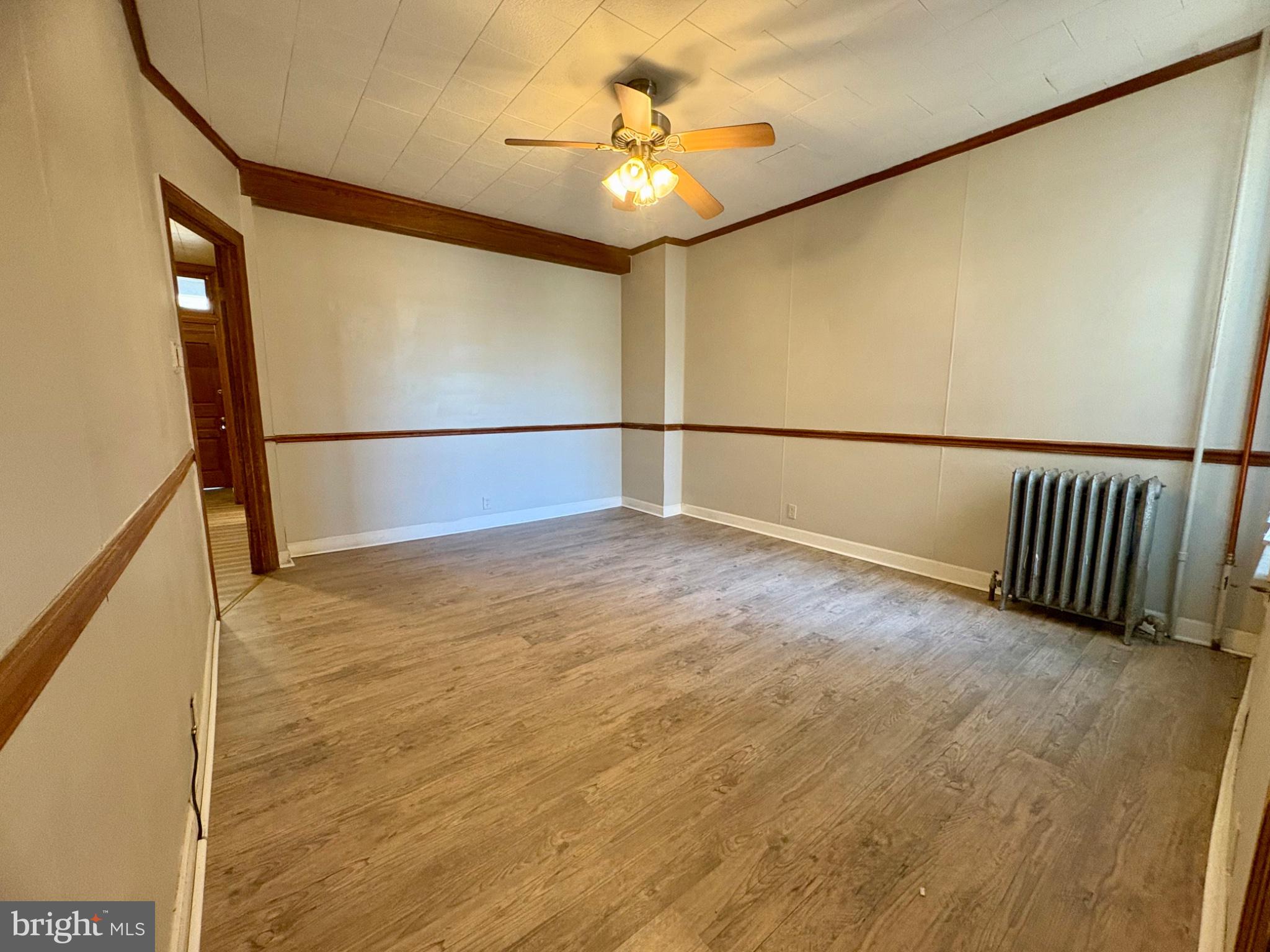 257 West Jackson Street York, PA 17401 - Photo 7 of 27 a view of an empty room with a window